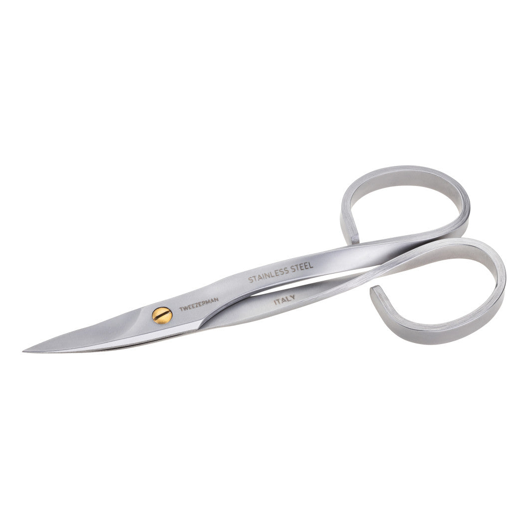Stainless steel Tweezerman manicure and pedicure nail scissors, compact and sharp for precise nail trimming.