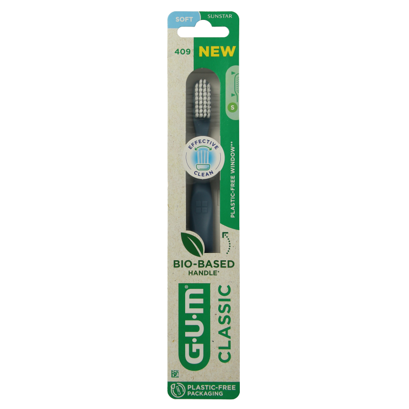 GUM Classic Soft toothbrush with medium-sized head, showing bristles and handle for effective dental cleaning.