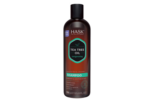 HASK tea tree oil and rosemary shampoo bottle, 355ml, featuring a clear label and green accents for natural hair care.