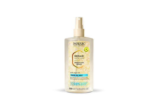 HASK weightless repair hair oil mist in a 120ml spray bottle, nourishing hair with a lightweight formula for shine and smoothness.