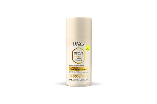 HASK Repair Bond Building Leave-In Treatment Cream in 100ml, showing the creamy hair care product in a tube.