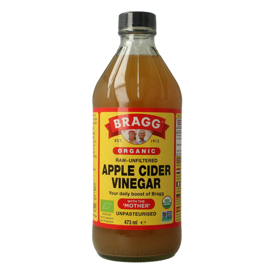 Bragg organic apple cider vinegar in a 473ml bottle, displayed with a clear label and glass bottle on a neutral background.