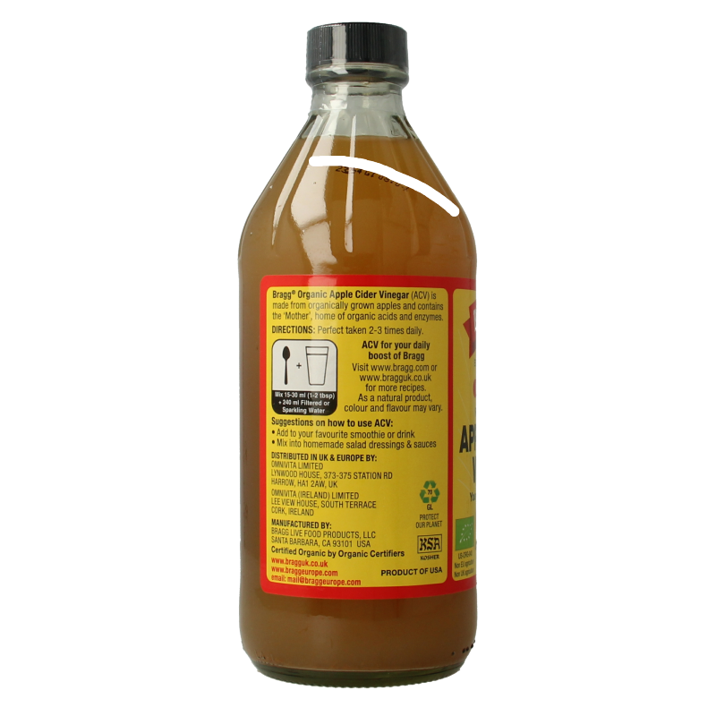 Bragg organic apple cider vinegar bottle in 473ml size, shown with label and cap, for use in drinks and health remedies.