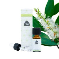 Chi Niaouli bio essential oil in 10ml bottle, natural etherische olie from Chi, with fresh leaves and botanical packaging visible.