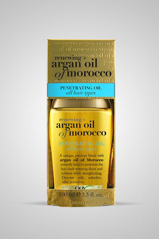 OGX Argan oil Morocco extra penetrating oil 100ml bottle, used for face skincare, with a sleek, amber-colored packaging.