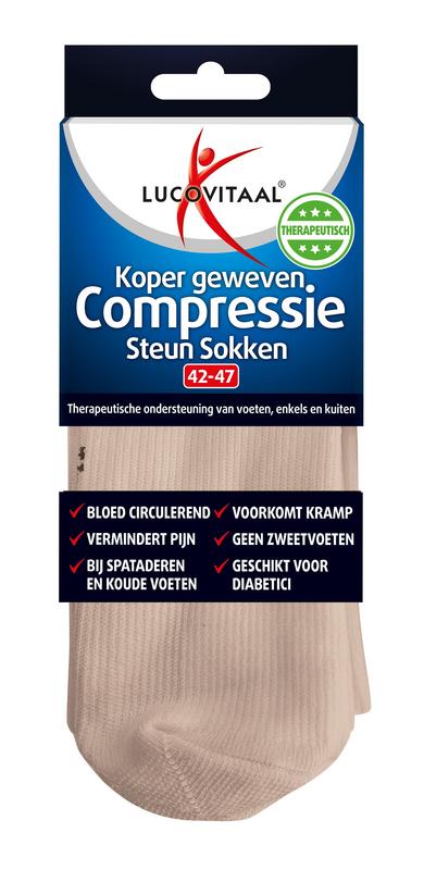 Lucovitaal copper compression socks in skin tone, size 42-47, shown as a pair of bandages for improved leg support and circulation.