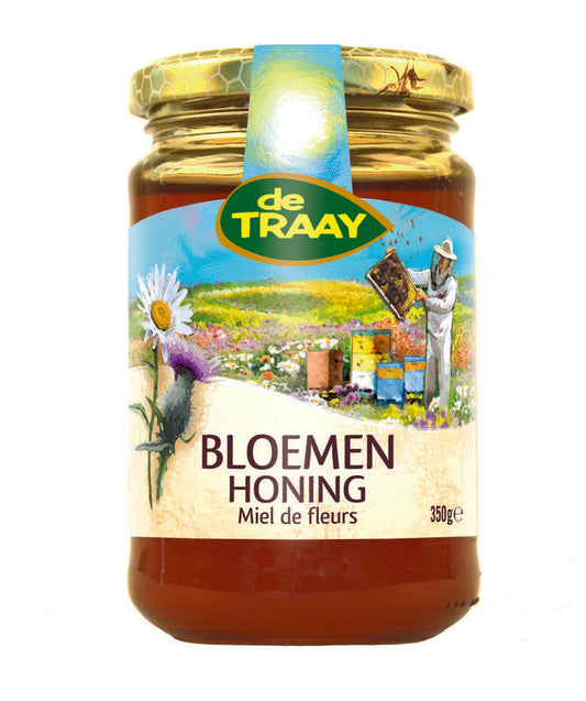 De Traay Bloemen Honing vloeibaar in een 350 gram glazen pot, natuurlijk en duurzame honing met bloemenaroma.