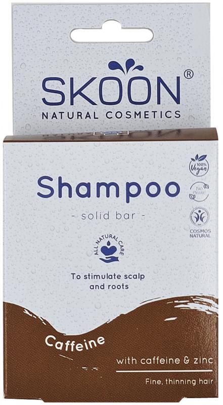 Skoon Caffeine Solid Shampoo bar, 90g, for hair care, shown in a close-up image highlighting the product's texture and packaging.