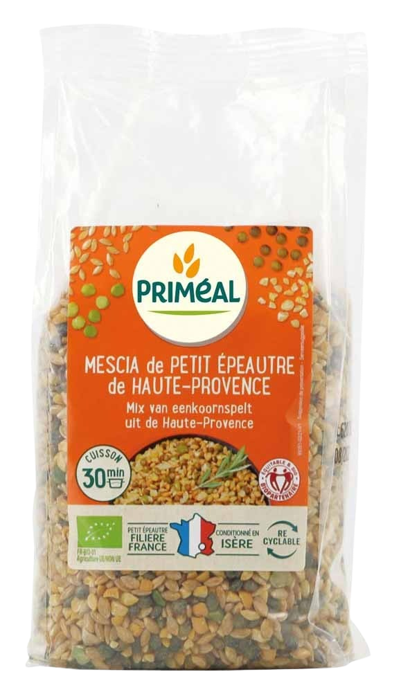 Primeal bio Eenkoornspelt mix ontbijtgranen in een witte kom, zichtbaar met speltkorrels en graanvlokken.