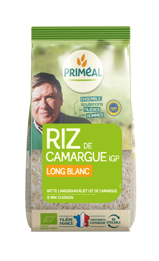 Primeal Witte langgraan rijst Camargue bio in 500g package, showcasing the rice grains in a natural setting.