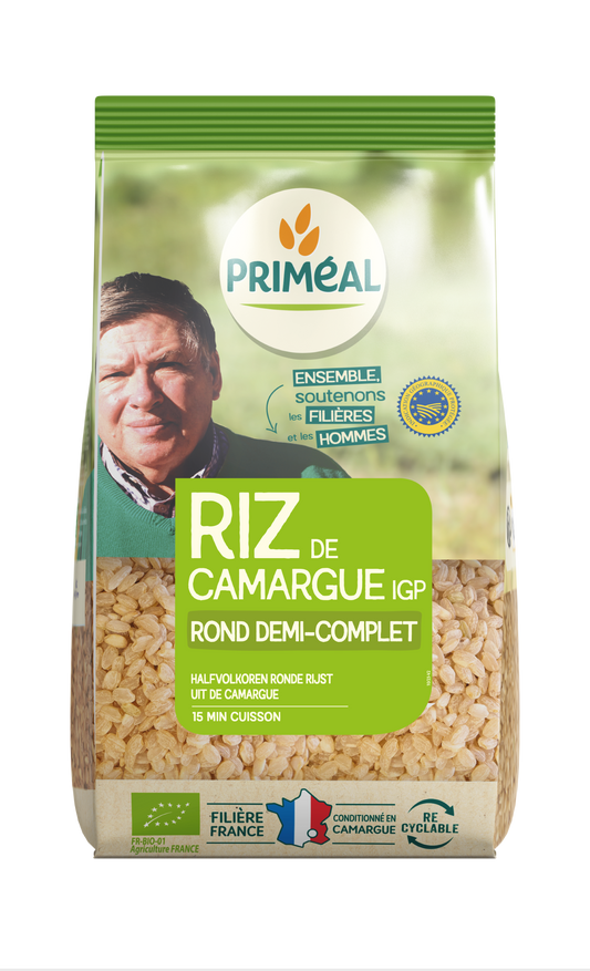 Primeal organic half-rough round rice from Camargue in a 1kg package, ideal for healthy pasta and rice dishes.