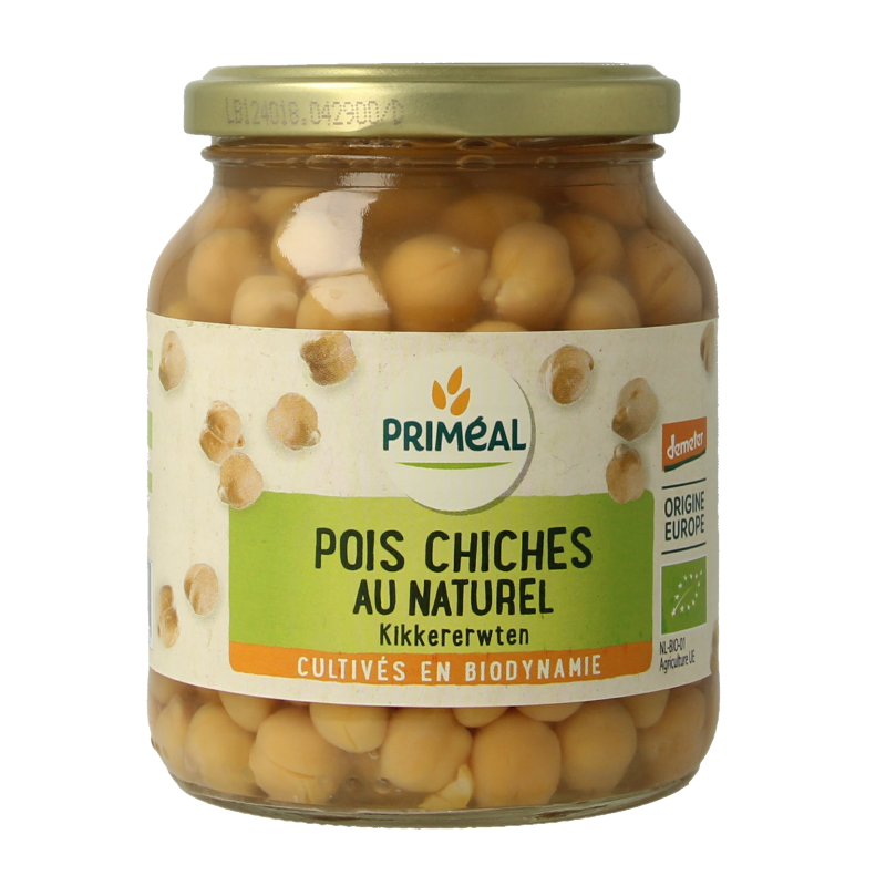 Primeal Demeter organic chickpeas in 350g package, positioned alongside potatoes, vegetables, and fruits on a grocery display.