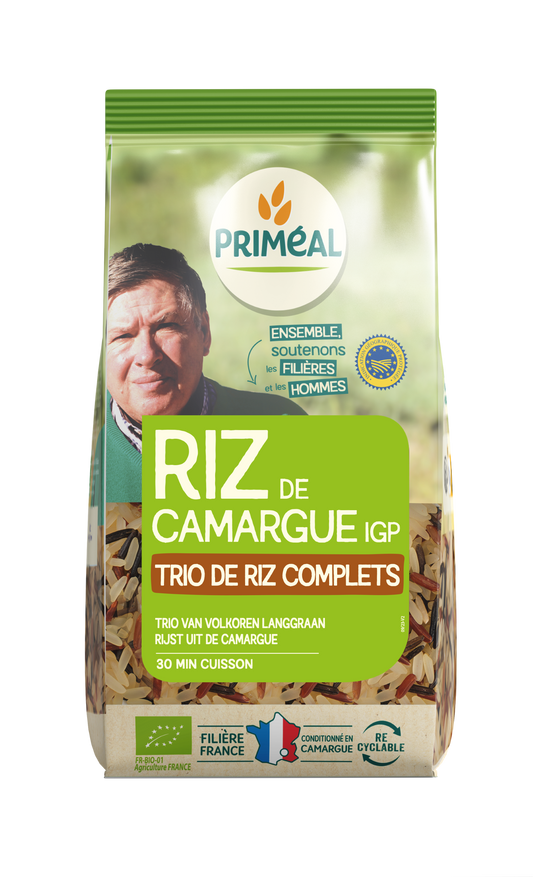 Primeal Rijst Camargue Trio Bio 500g package showing rice grains in a clear bag, highlighting organic rice product.