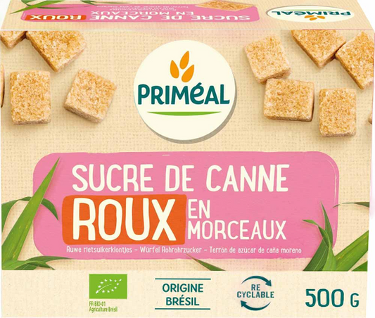 Primeal brown cane sugar lumps in 500g pack, natural sweetener for baking and beverages, featuring brown cane sugar clumps.