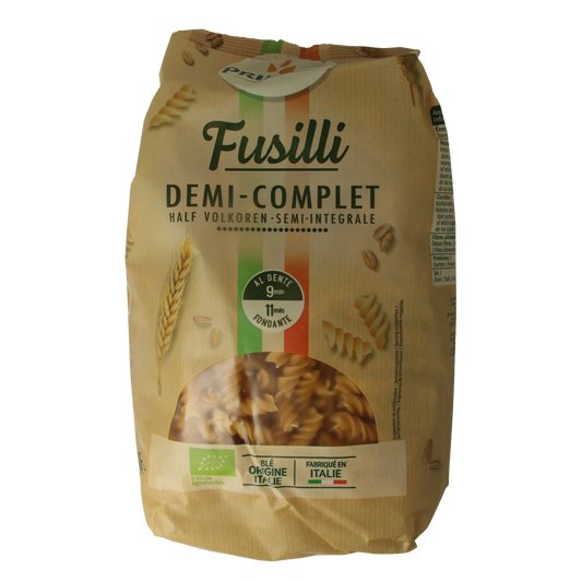 Primeal Fusilli Halfvolkoren bio ontbijtgranen in familie verpakking, 1 kg, showing the whole wheat pasta in a natural setting.