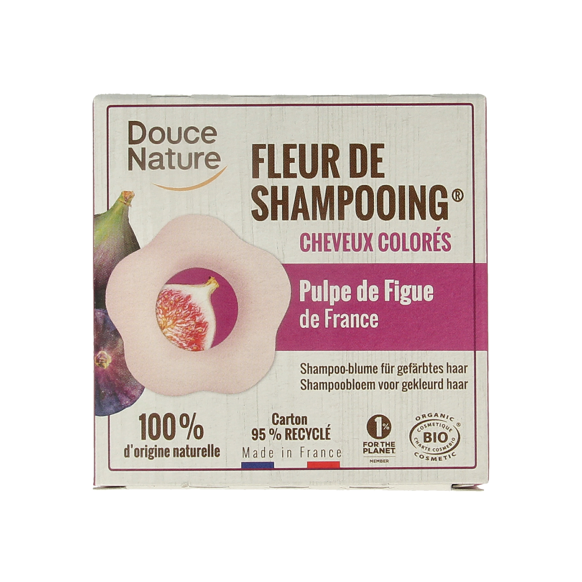Douce Nature shampoo bar for colored hair, 85g, natural hair care product with purple packaging and textured soap surface.