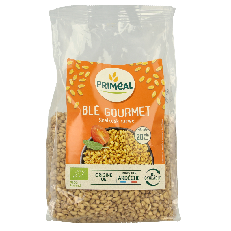 Primeal Tarwe gastronomisch bio ontbijtgranen in een 500 gram verpakking, close-up van de graanvlokken in de afbeelding.