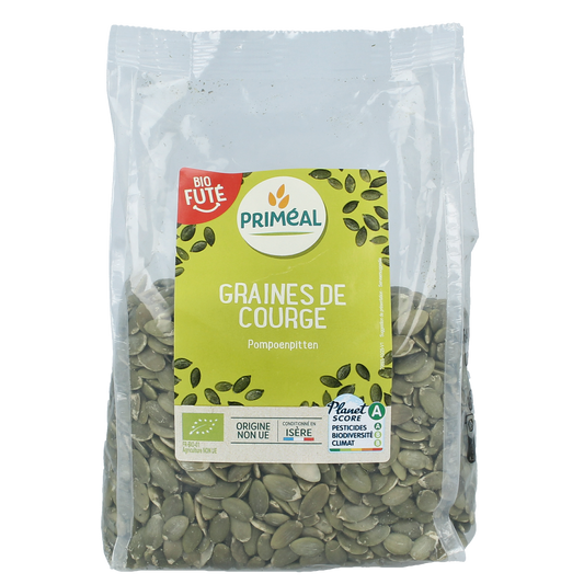 Organic Primeal pumpkin seeds in a 500g bag, raw superfood seeds with natural pumpkin kernel appearance.