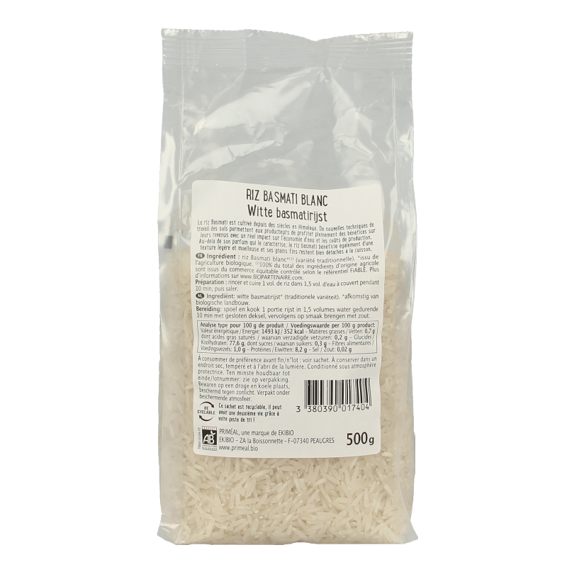 Primeal bio witte basmati rijst in 500g verpakking, showing fluffy, cooked rice with grains visible in a natural setting.