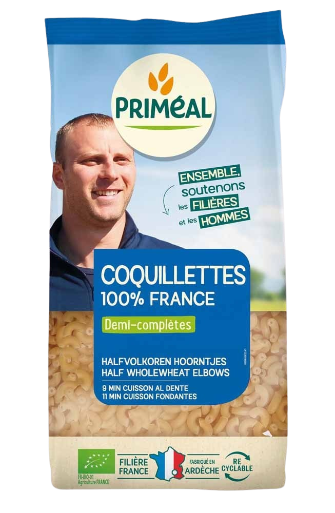 Primeal halfvolkoren hoorntjes bio pasta in 500g package, whole wheat corn-shaped pasta for cooking and salads.