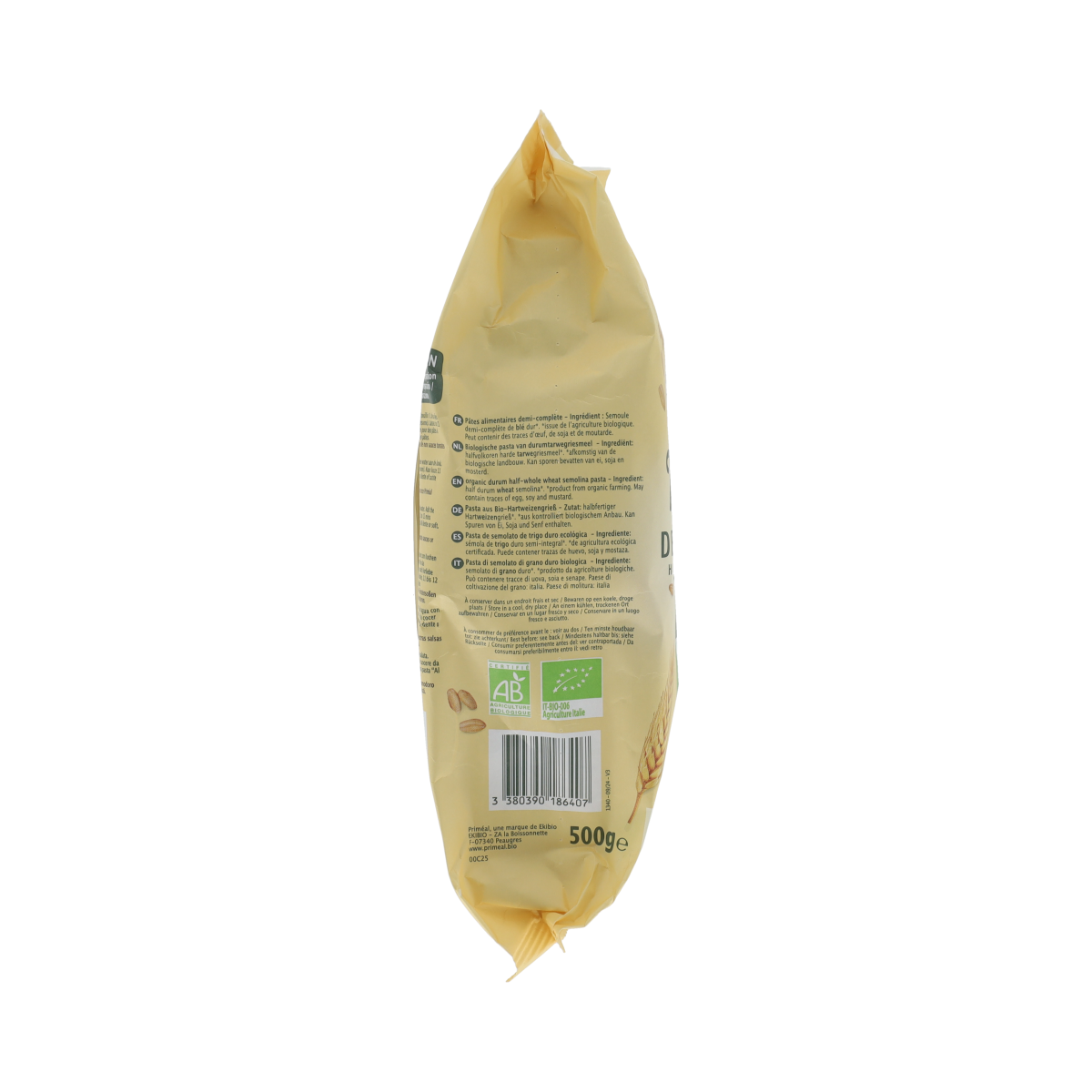 Primeal Halfvolkoren Farfalle bio pasta, 500g, showing uncooked whole wheat bow-tie pasta on a white background.