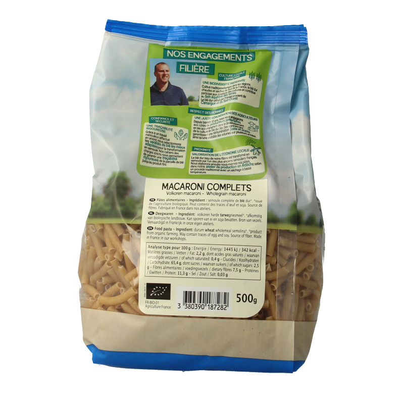 Primeal organic whole wheat macaroni pasta in a 500g package, showcasing the pasta's shape and texture.