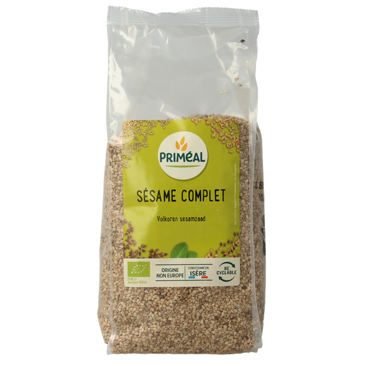 Primeal organic whole sesame seeds in a 500g package, raw superfood, displayed in a clear container with sesame seeds visible.