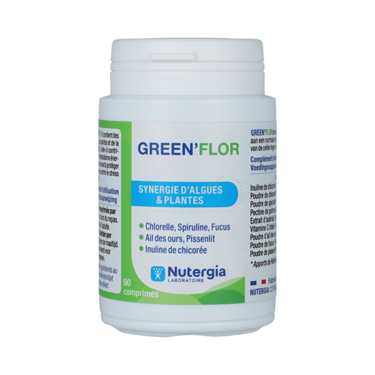 Nutergia Green Flor herbal supplement tablets showing a close-up of the green tablets in a container.