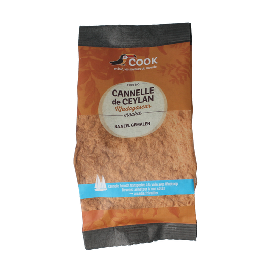 Cook Kaneel gemalen bio 100g, organic ground cinnamon spice in a clear container, ideal for baking and cooking.