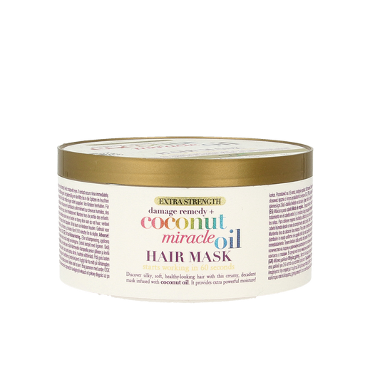 OGX Extra Strength Coconut Miracle Oil Hair Mask in 300ml jar, nourishing hair care product for damaged hair.