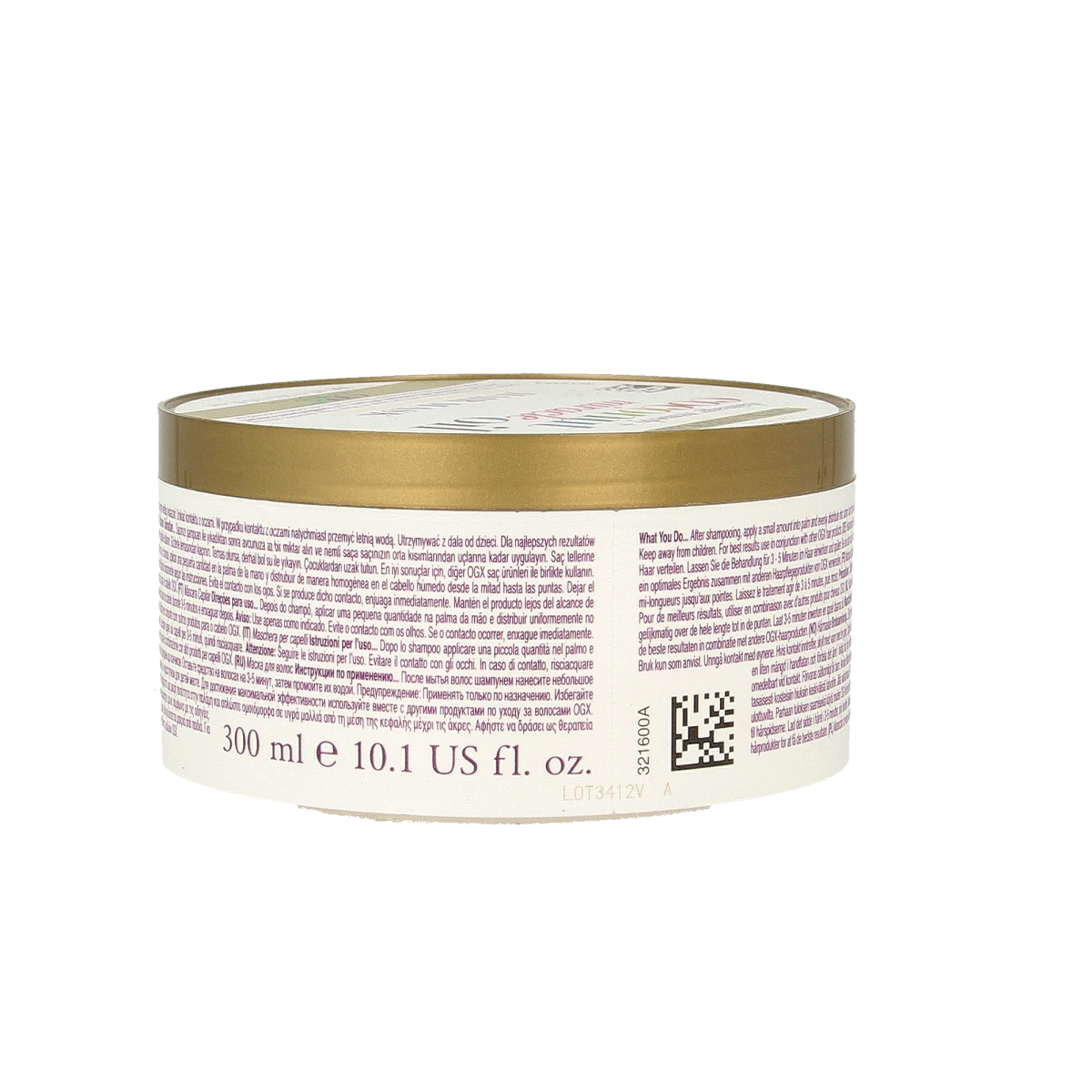 OGX Extra Strength Coconut Miracle Oil Hair Mask in 300ml jar, nourishing damage repair hair care treatment.