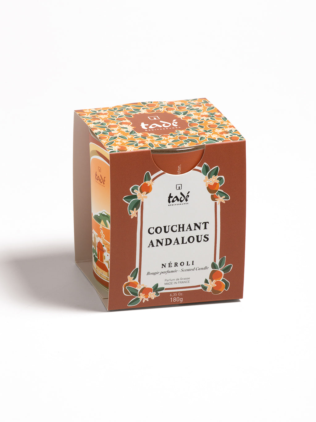 Tade Neroli scented candle in 180g glass jar with a lit wick, showcasing the elegant candle design and vibrant flame.