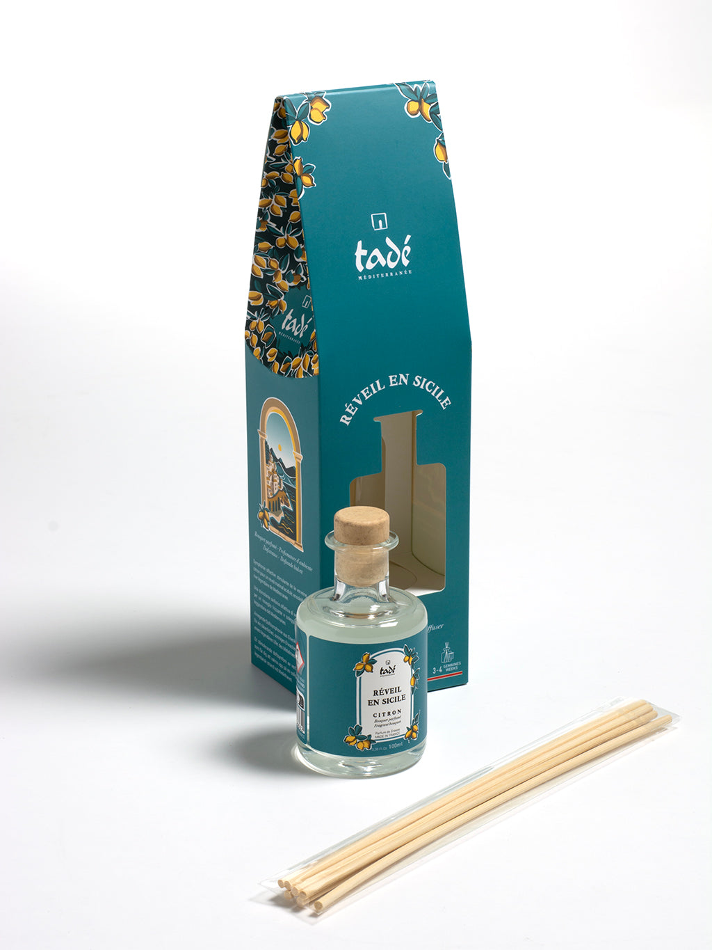 Tade lemon scented reed diffuser with 100ml clear glass bottle and natural reeds for home fragrance.