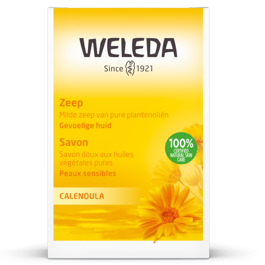 Weleda Calendula Zeep 100g soap bar with natural calendula ingredients, showing the soap's packaging and fresh calendula flowers