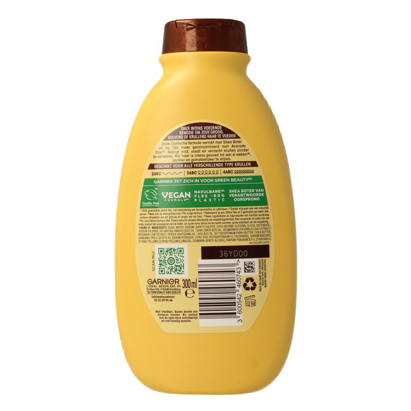 Garnier Loving Blends avocado and shea shampoo bottle, 300ml, for nourishing hair care.