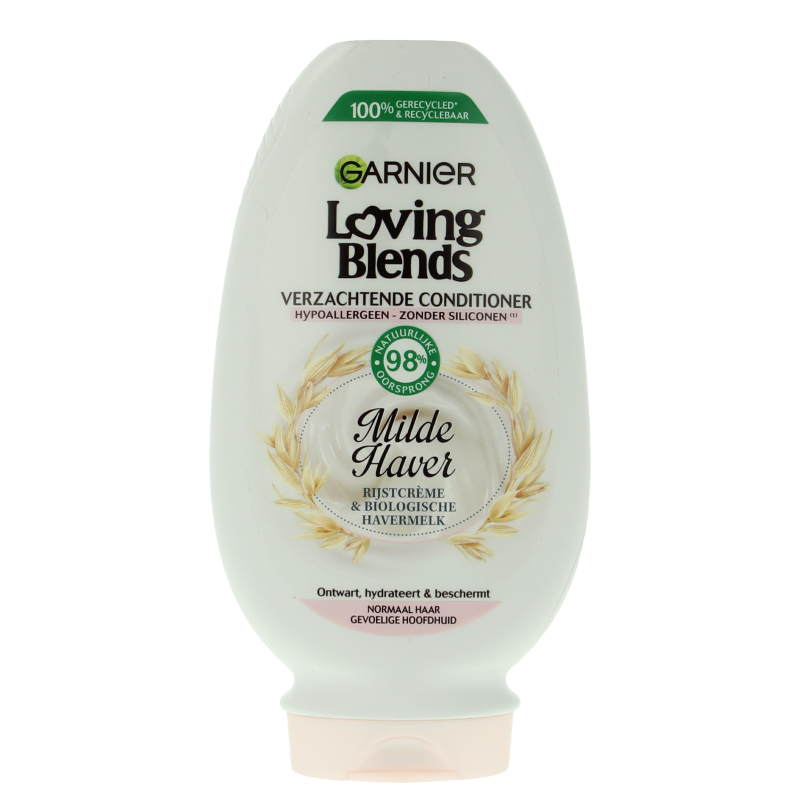 Garnier Loving Blends conditioner bottle for hair care, 250ml, with floral design and product label visible.
