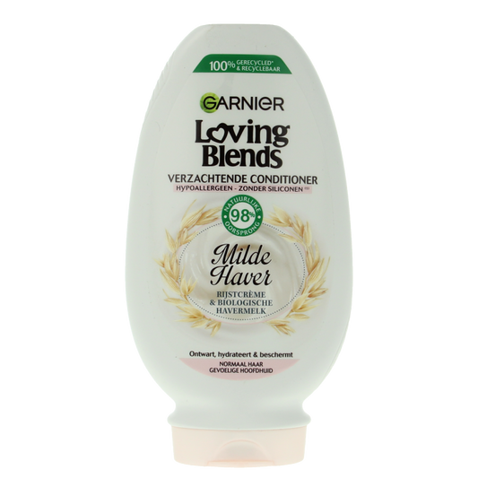 Garnier Loving Blends conditioner bottle for hair care, 250ml, with floral design and product label visible.