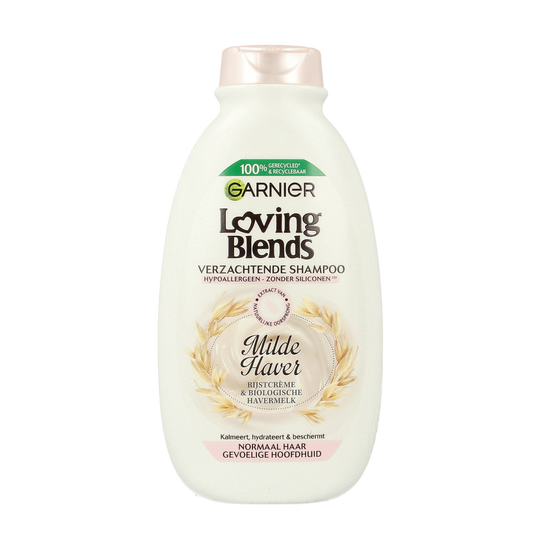 Garnier Loving Blends shampoo bottle for hair care, 300ml, with vibrant packaging and product details visible.
