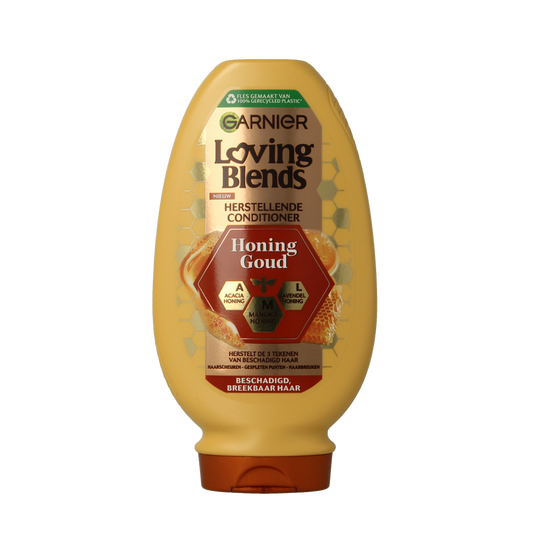 Garnier Loving Blends conditioner Honing Goud bottle, 250ml, for hair care, with golden packaging and product label visible.
