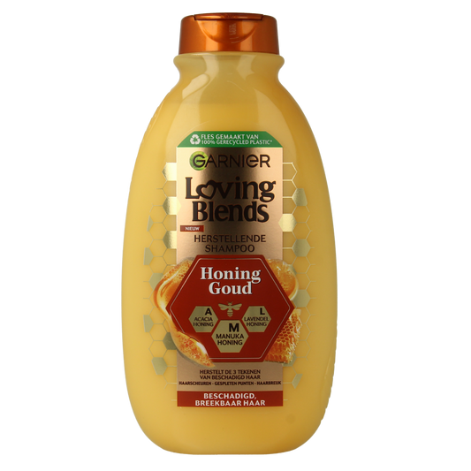 Garnier Loving Blends Goud shampoo bottle, 300ml, showcasing the Haarverzorging product with golden packaging and label details.