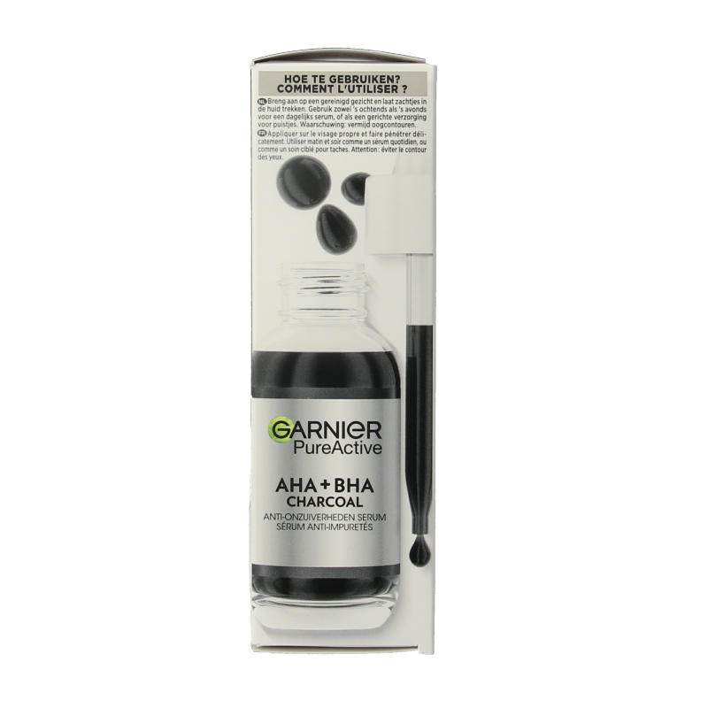 Garnier PureActive AHA + BHA charcoal serum in a 30ml bottle, facial skincare product with a black dropper cap and label.