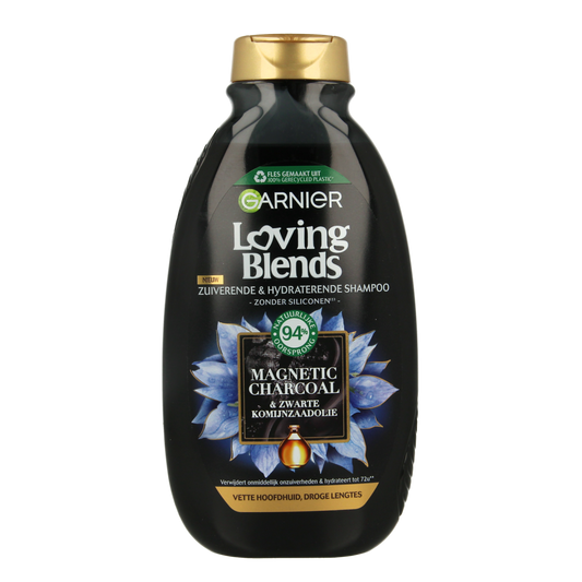 Garnier Loving Blends charcoal shampoo bottle, 300ml, for hair care with natural ingredients, shown from the front.