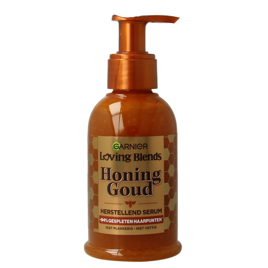 Garnier Honing goud haarserum in 115ml bottle, hair care product with gold-colored serum for nourishing hair.