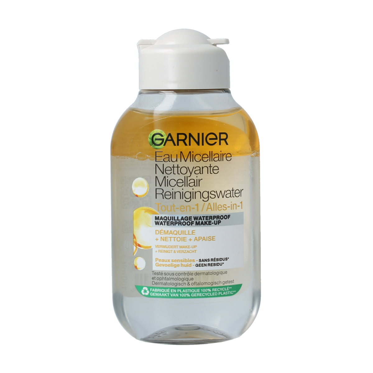 Garnier SkinActive micellar cleansing water oil in a 100ml bottle, facial skincare product with clear liquid and pump dispenser.