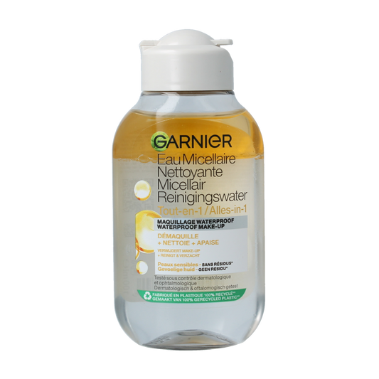 Garnier SkinActive micellar cleansing water oil in a 100ml bottle, facial skincare product with clear liquid and pump dispenser.