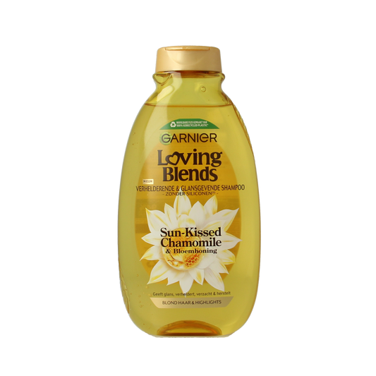 Garnier Loving Blends chamomile shampoo bottle, 300ml, for hair care with natural chamomile ingredients.