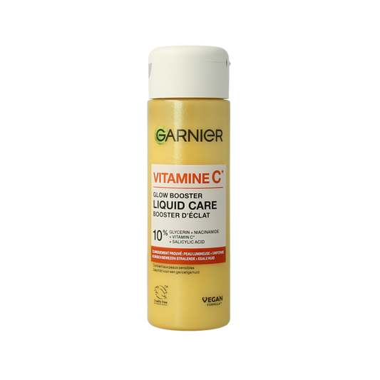 Garnier Vitamin C glow booster liquid facial care bottle, 120ml, featuring brightening skincare for radiant skin.