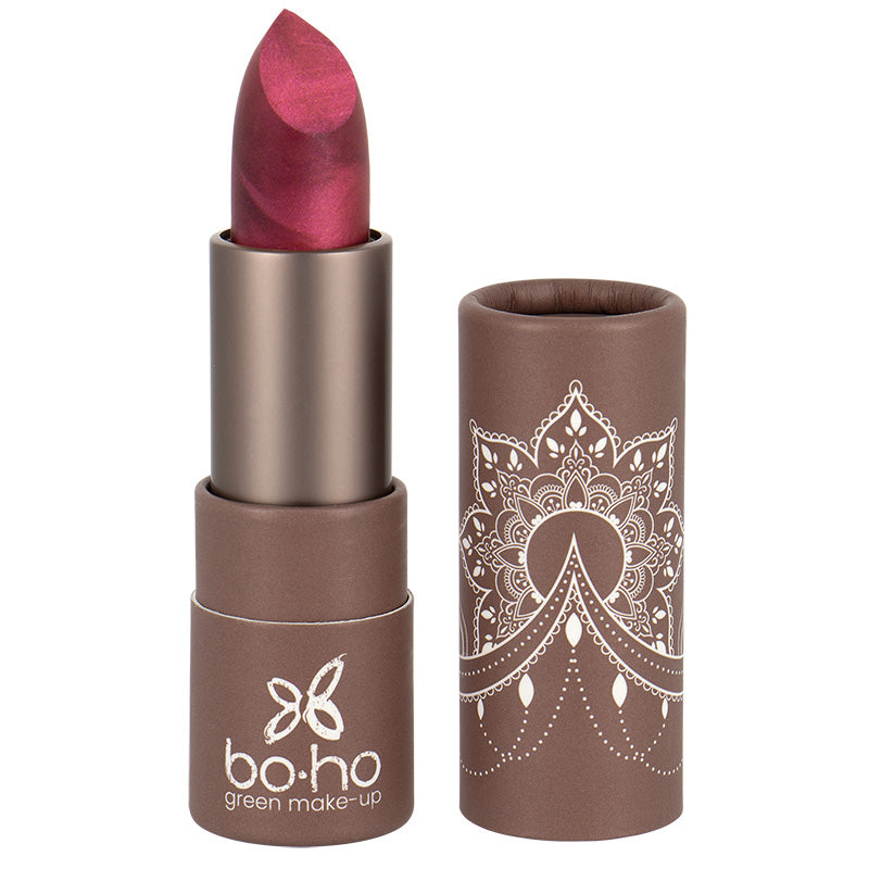 Boho Green Makeup lipstick in Cassis 406, green makeup brand, showing the 3.5g bullet with deep purple shade.