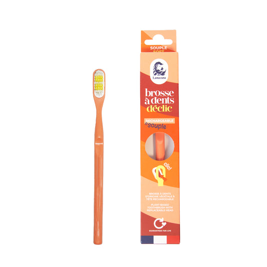 Lamazuna soft coral toothbrush for gentle cleaning, shown with a single toothbrush in natural setting.