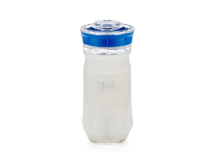 Kefirko milk-water kefir maker in 1400ml size, used for fermenting milk and water kefir at home, white plastic jar with lid.